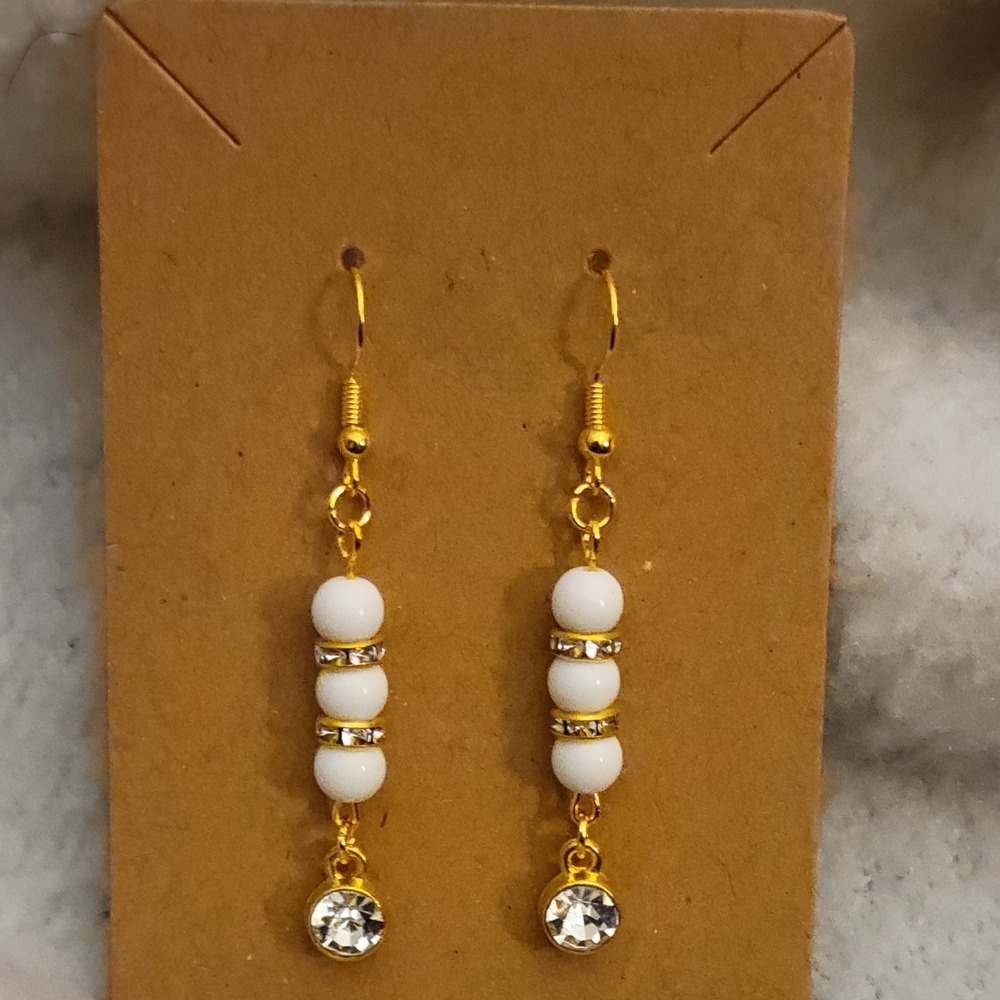Elegant Gold and White Dangle Earrings